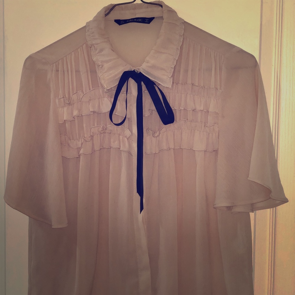Pink transparent shirt and black knot